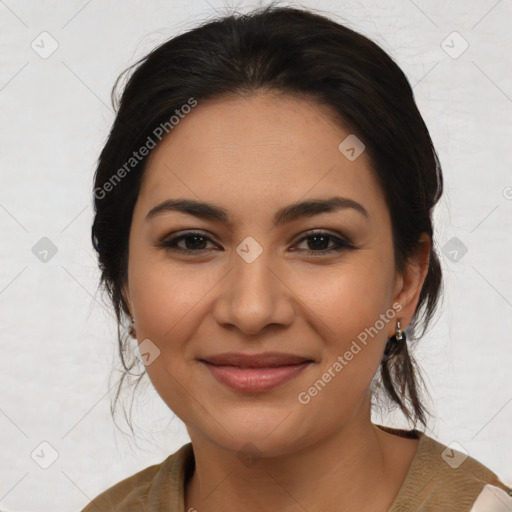 Joyful latino young-adult female with medium  brown hair and brown eyes