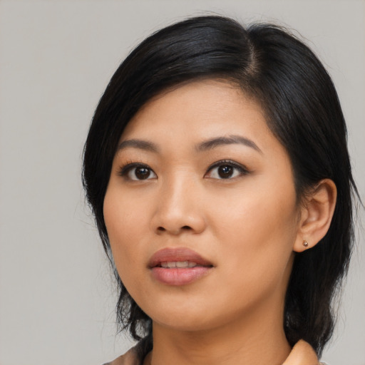 Neutral asian young-adult female with medium  black hair and brown eyes