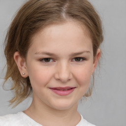 Joyful white child female with medium  brown hair and grey eyes