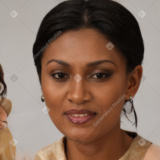 Joyful black young-adult female with medium  brown hair and brown eyes