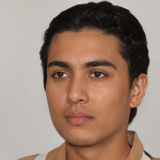 Neutral latino young-adult male with short  black hair and brown eyes