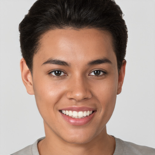 Joyful white young-adult female with short  brown hair and brown eyes