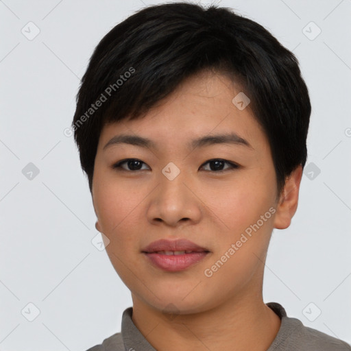 Joyful asian young-adult female with short  black hair and brown eyes