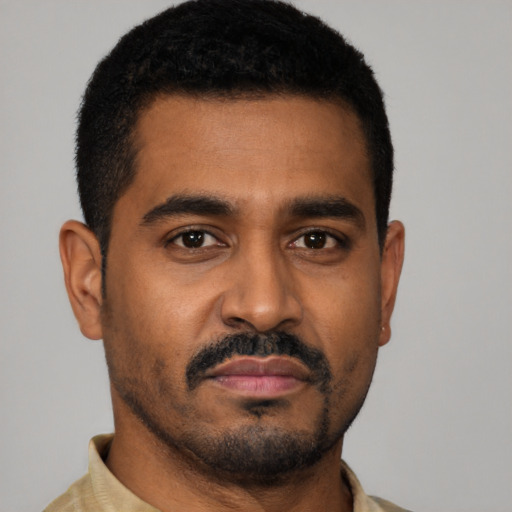 Neutral black young-adult male with short  black hair and brown eyes