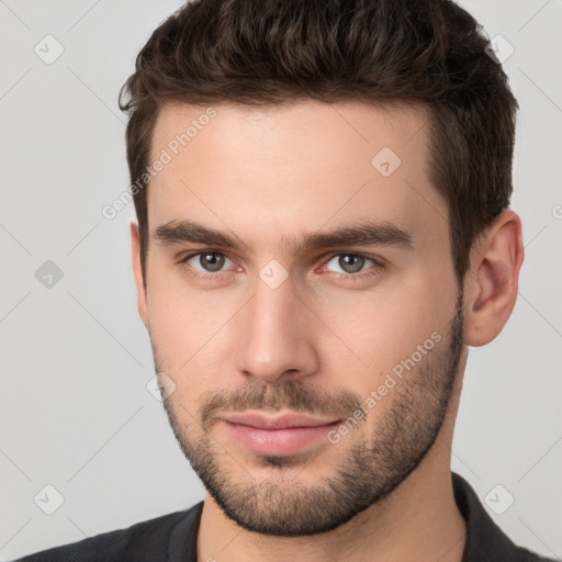 Neutral white young-adult male with short  brown hair and brown eyes