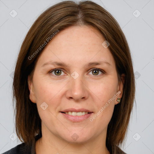 Joyful white adult female with medium  brown hair and grey eyes