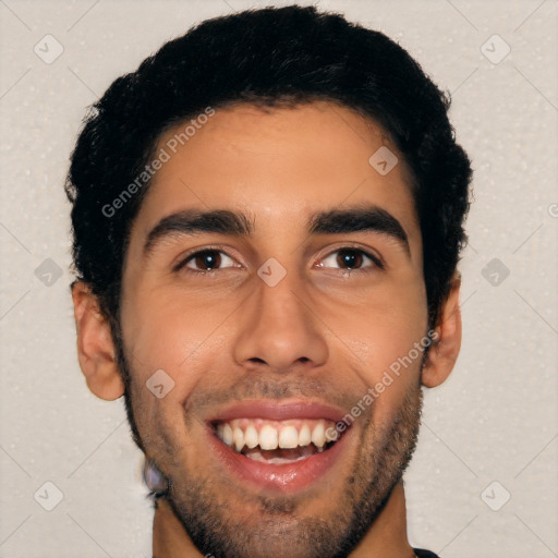 Joyful latino young-adult male with short  black hair and brown eyes