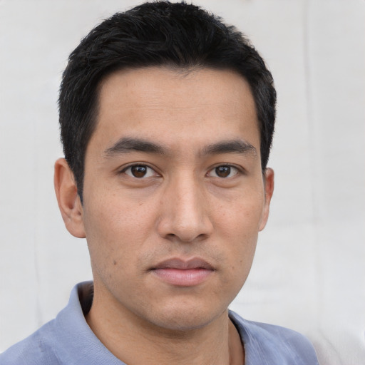 Neutral asian young-adult male with short  black hair and brown eyes