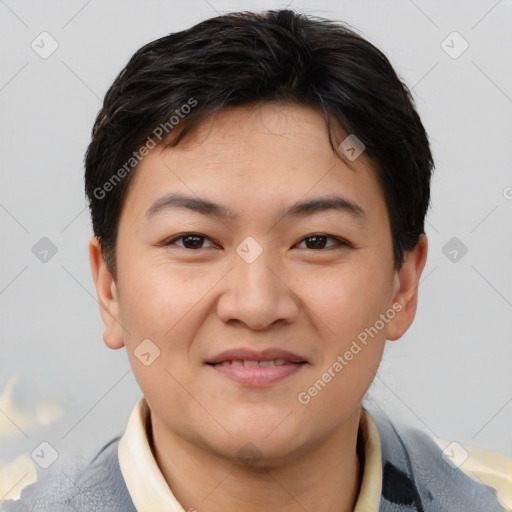 Joyful asian young-adult male with short  brown hair and brown eyes