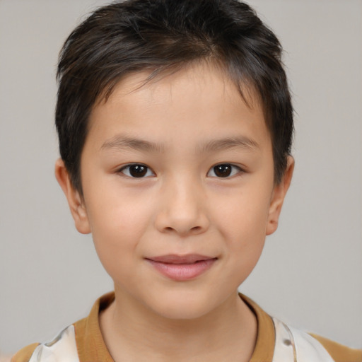 Joyful white child female with short  brown hair and brown eyes