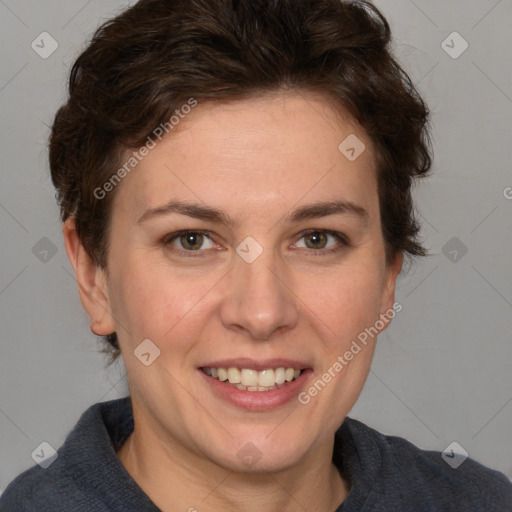 Joyful white young-adult female with medium  brown hair and blue eyes