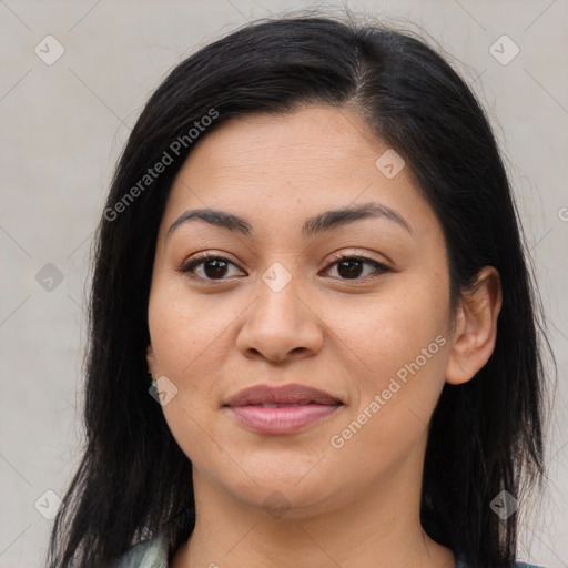 Joyful asian young-adult female with long  brown hair and brown eyes