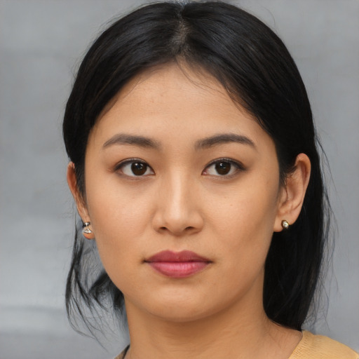 Neutral asian young-adult female with medium  black hair and brown eyes