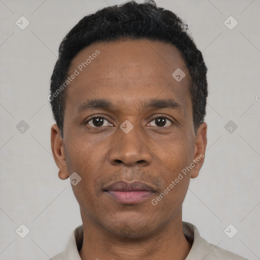 Neutral black young-adult male with short  black hair and brown eyes