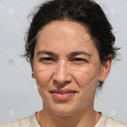 Joyful white adult female with short  brown hair and brown eyes