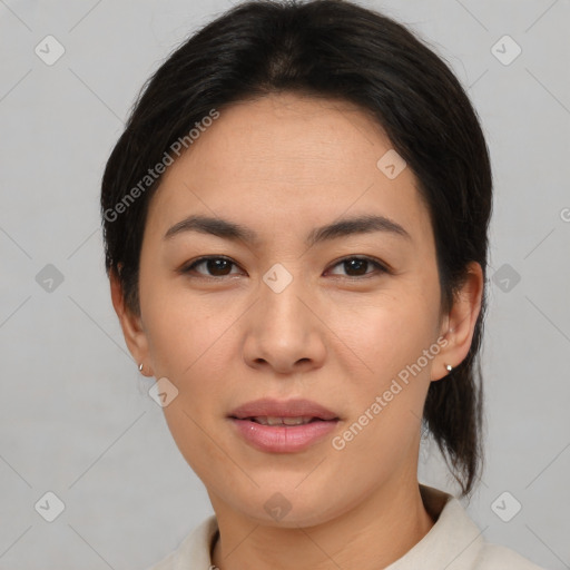 Joyful asian young-adult female with medium  brown hair and brown eyes