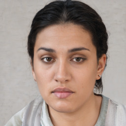 Neutral white young-adult female with medium  brown hair and brown eyes