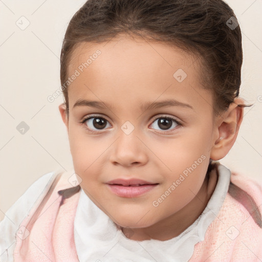 Joyful white child female with short  brown hair and brown eyes