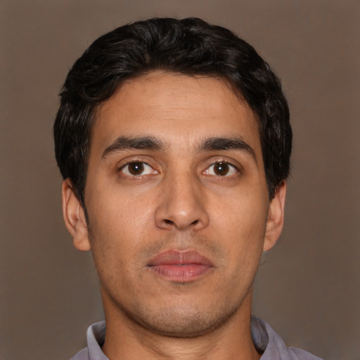 Neutral white young-adult male with short  black hair and brown eyes