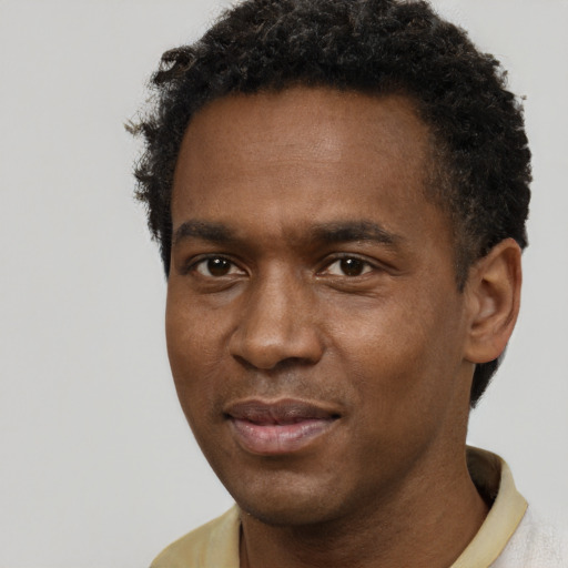 Neutral black young-adult male with short  brown hair and brown eyes