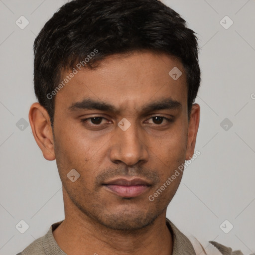 Neutral white young-adult male with short  black hair and brown eyes
