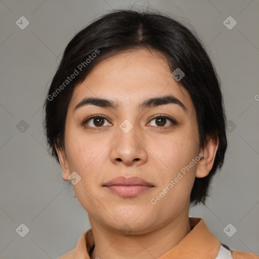 Joyful latino young-adult female with medium  brown hair and brown eyes