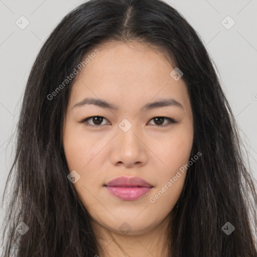 Joyful asian young-adult female with long  brown hair and brown eyes