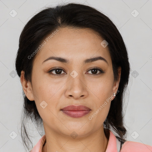 Joyful latino young-adult female with medium  brown hair and brown eyes