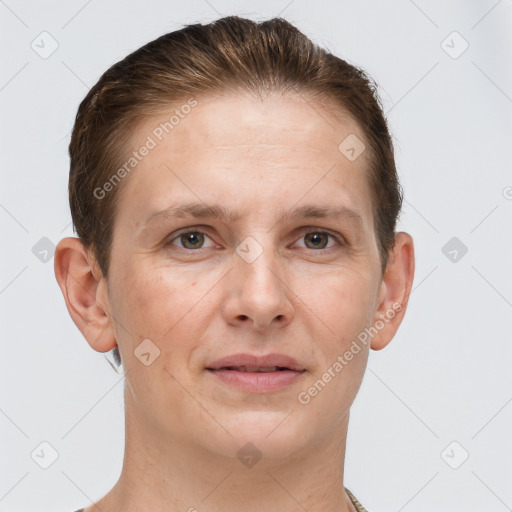 Joyful white adult female with short  brown hair and grey eyes