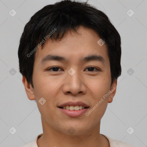 Joyful asian young-adult male with short  brown hair and brown eyes