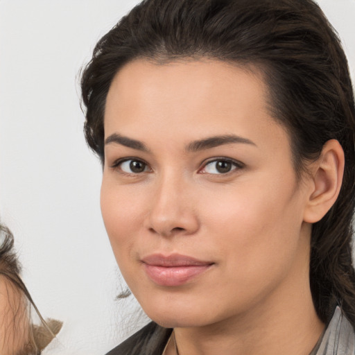 Neutral white young-adult female with medium  brown hair and brown eyes