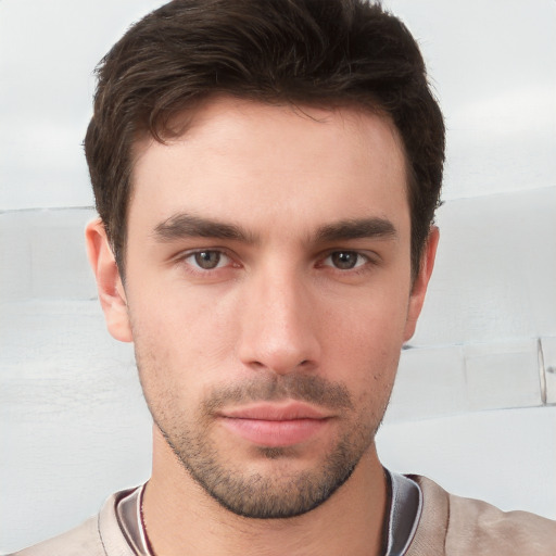 Neutral white young-adult male with short  brown hair and brown eyes