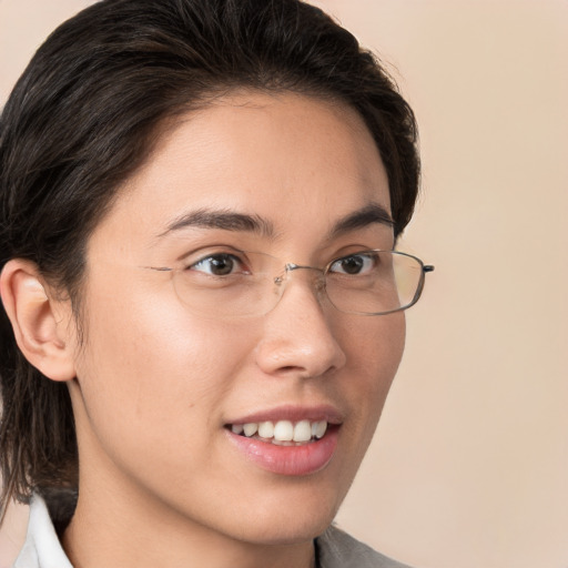 Joyful white young-adult male with medium  brown hair and brown eyes