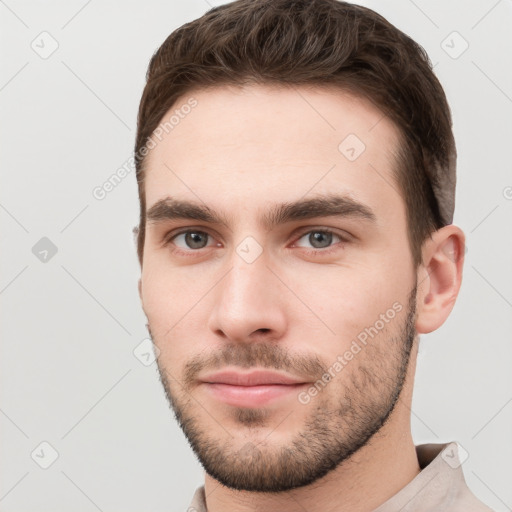 Neutral white young-adult male with short  brown hair and grey eyes