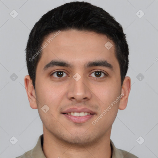 Joyful white young-adult male with short  black hair and brown eyes