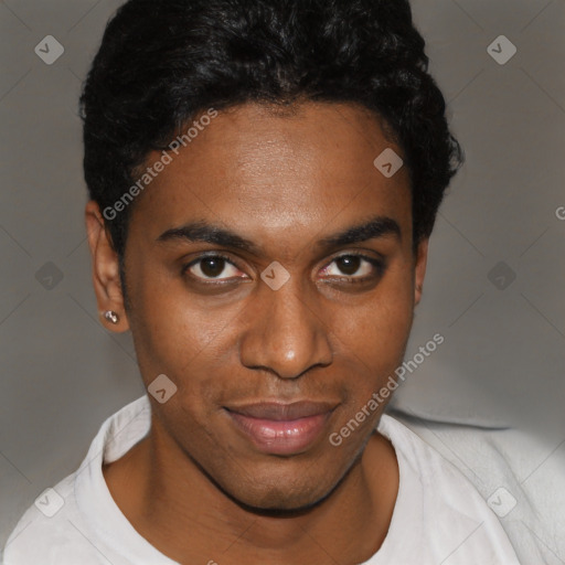 Joyful black young-adult male with short  brown hair and brown eyes