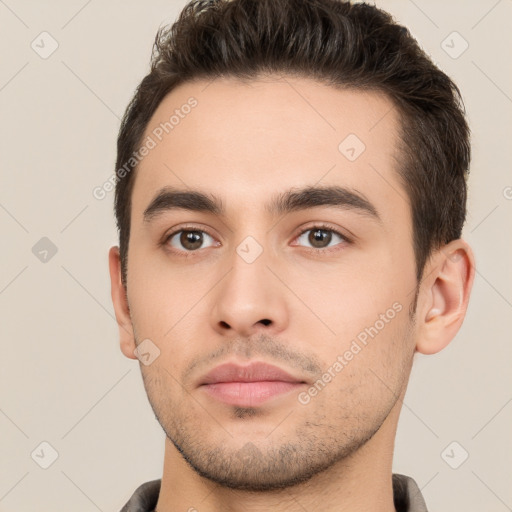 Neutral white young-adult male with short  brown hair and brown eyes