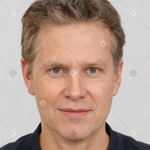 Joyful white middle-aged male with short  brown hair and brown eyes