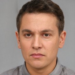 Neutral white adult male with short  brown hair and brown eyes