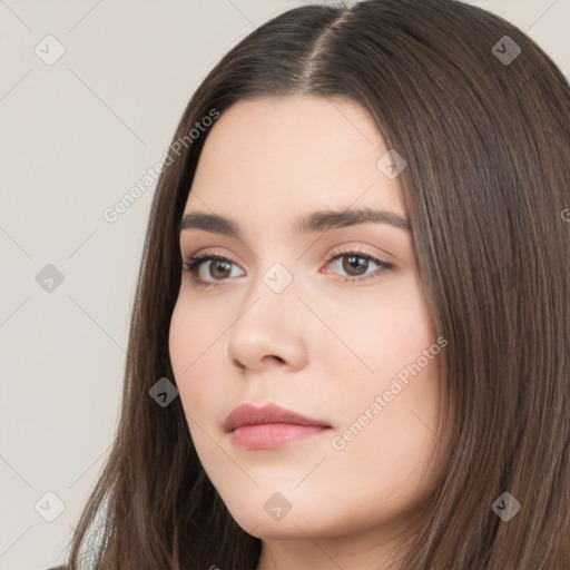 Neutral white young-adult female with long  brown hair and brown eyes