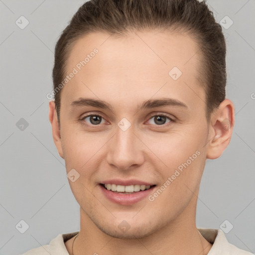 Joyful white young-adult female with short  brown hair and brown eyes