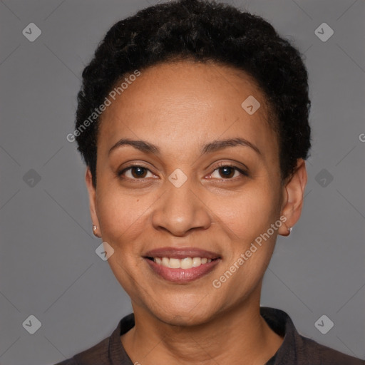 Joyful latino young-adult female with short  black hair and brown eyes