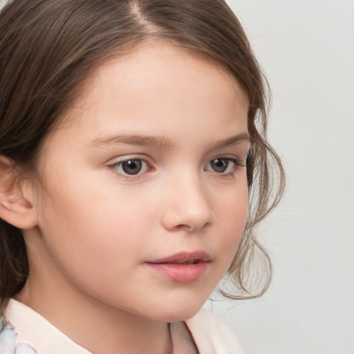 Neutral white child female with medium  brown hair and brown eyes