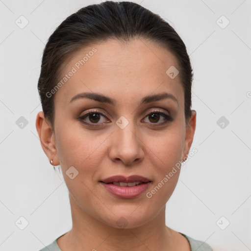 Joyful white young-adult female with short  brown hair and brown eyes