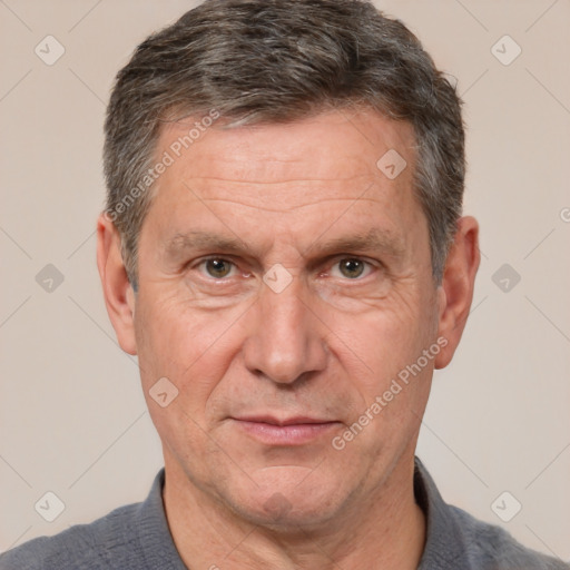 Joyful white middle-aged male with short  brown hair and brown eyes