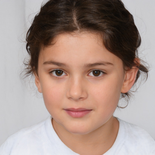 Joyful white child female with medium  brown hair and brown eyes