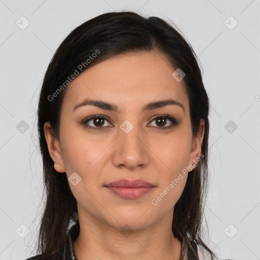 Joyful latino young-adult female with medium  brown hair and brown eyes