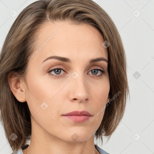 Neutral white young-adult female with medium  brown hair and grey eyes