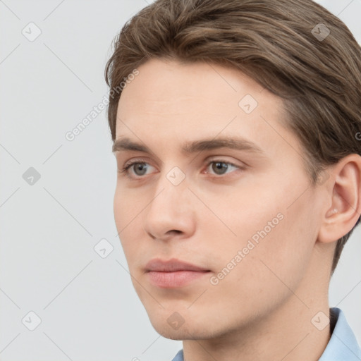 Neutral white young-adult male with short  brown hair and grey eyes