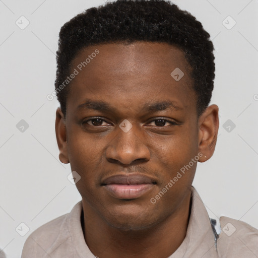 Joyful black young-adult male with short  brown hair and brown eyes